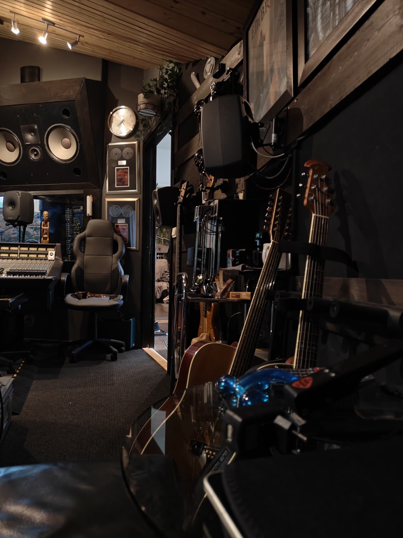 Guitars along the wall of the control room